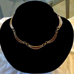 Beautiful Vintage necklace. Gold tone metal with red small stones in front 3
